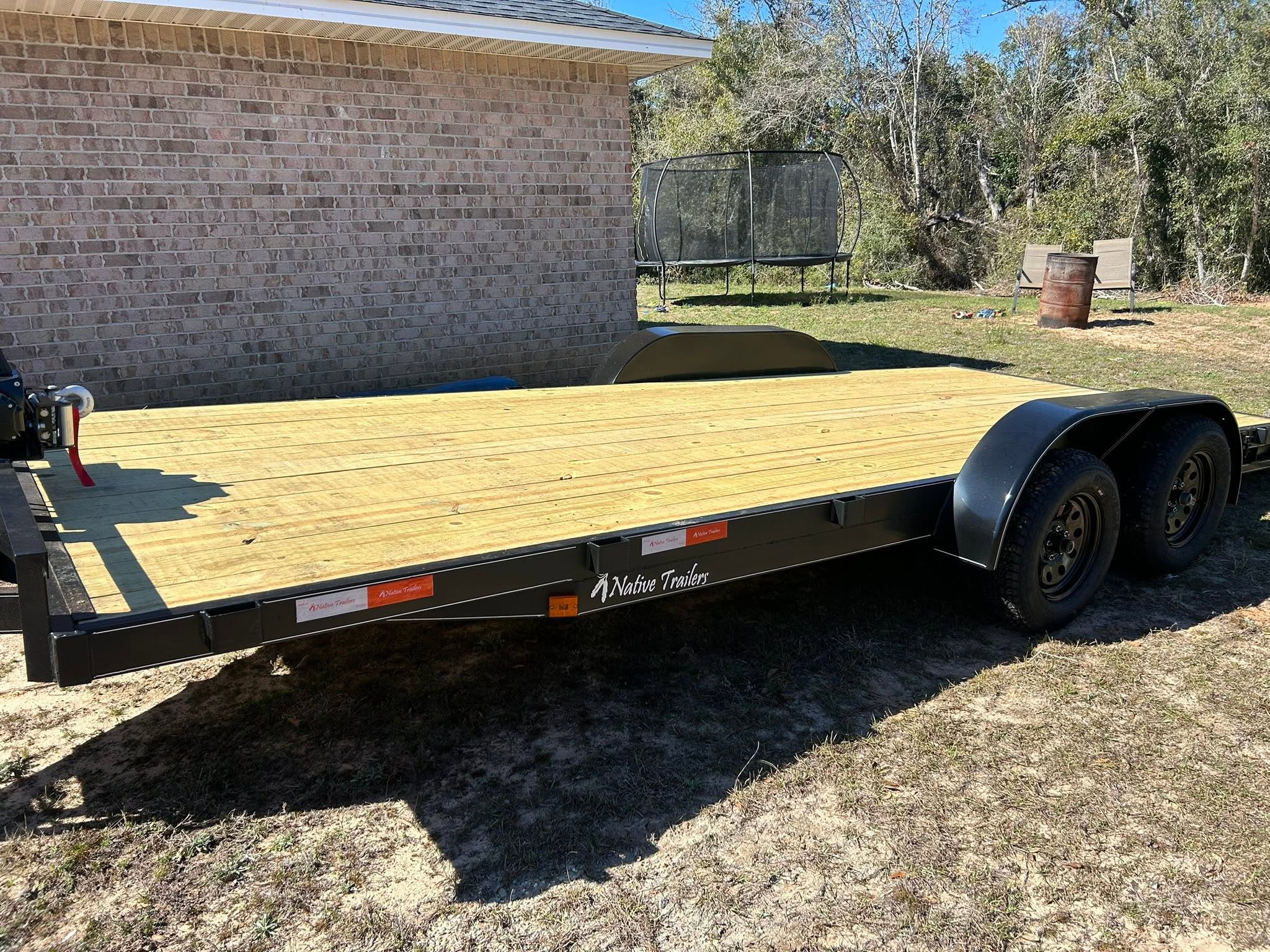Wood deck utility trailer available for rent in Milton, FL